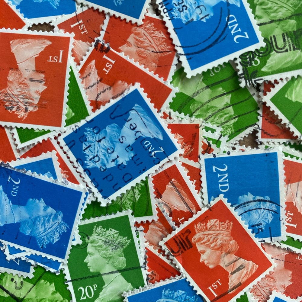 100+ bright QEII postage stamps